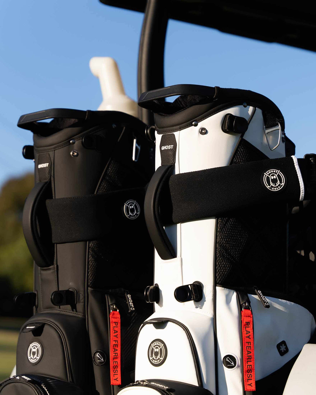 2 Golf Bags on Golf Cart with Cart Strap Sleeve.