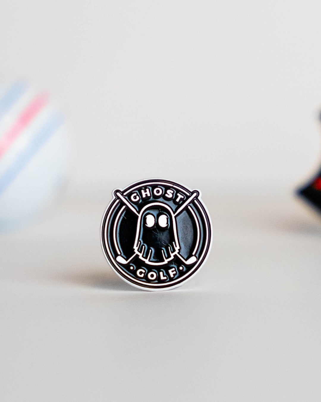 Golf Ball Marker Black Circle with White Ghost Logo