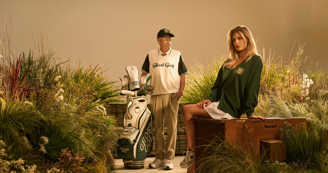 Male and Female Posing with a Golf Bag
