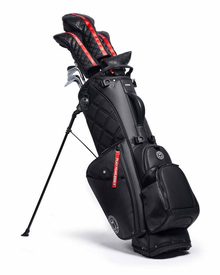 RONIN Black and Carbon Fiber Accents Golf Bag with Red Tags. Golf CLubs with Black and Red Stripe Head Covers. 