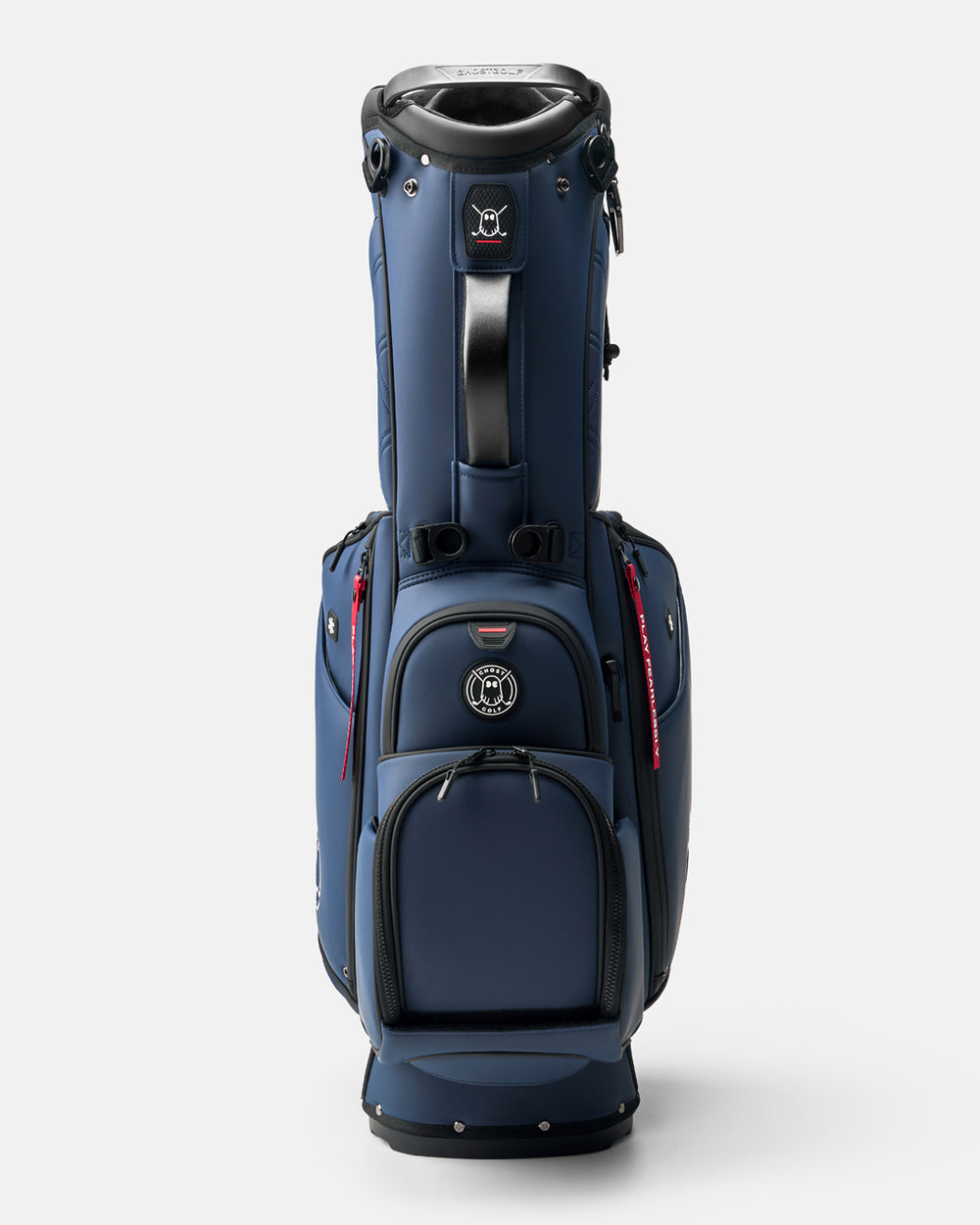 GHOSTGOLF Anyday Patriot golf bag in navy, shown at a front angle with zippered pockets, an emblem Ghost Golf logo, and a red “Play Fearlessly” tag.