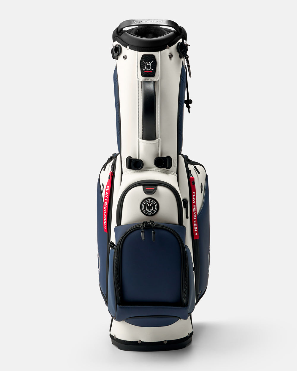 GHOSTGOLF Anyday Valor golf bag in white and navy, shown at a front angle with zippered pockets, an emblem Ghost Golf logo, and a red “Play Fearlessly” tag.