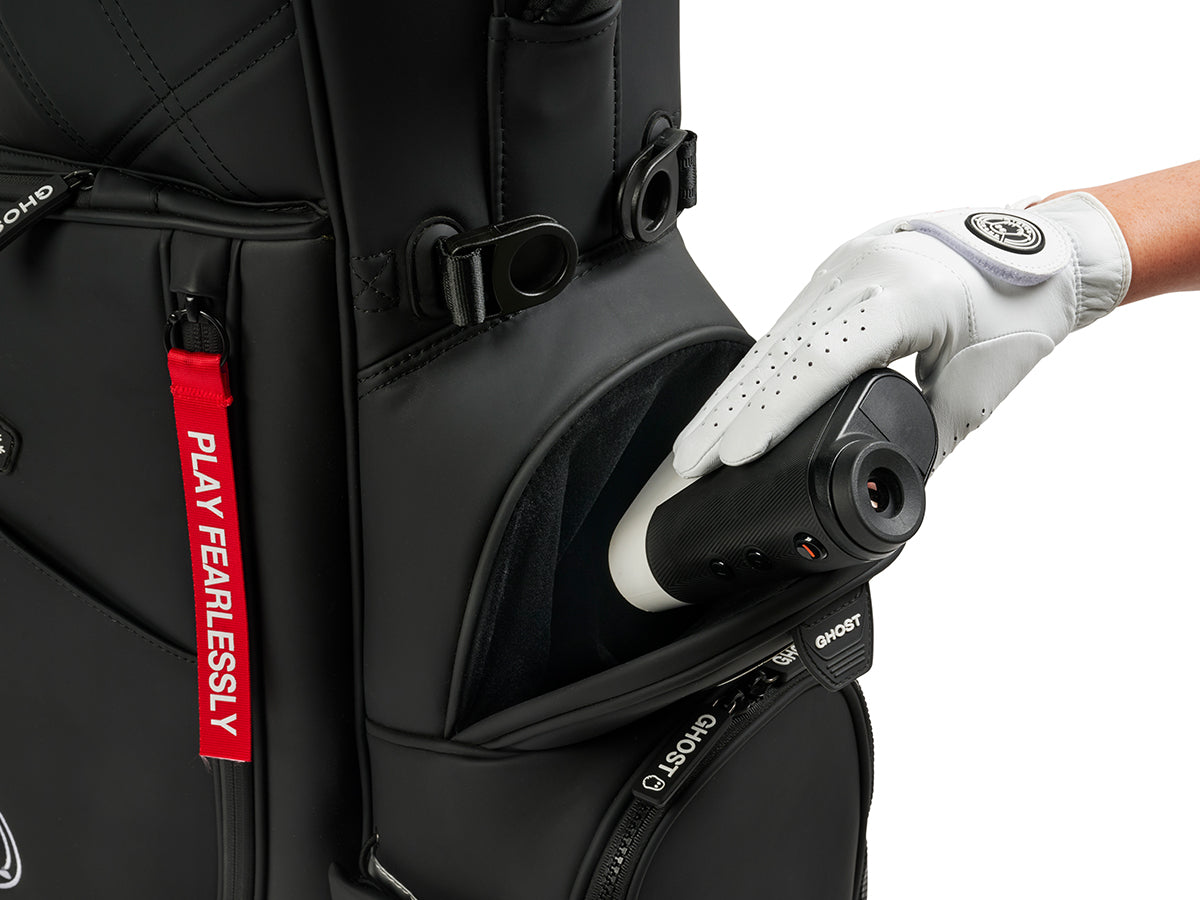 Golf bag with a golf range finder being inserted, featuring a brand logo on a white background.
