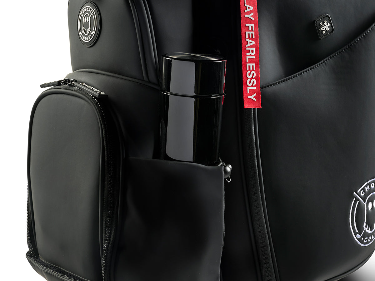 Black Golf Bag with a water bottle and red tag on a white background
