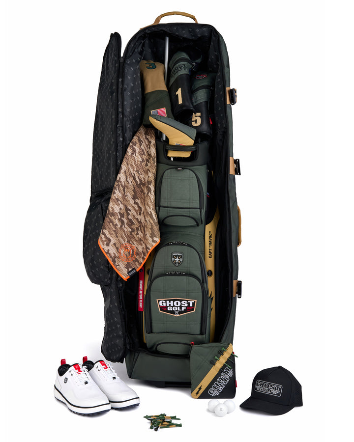 Front product shot of the G-Suit Primary AWOL Travel Bag showcasing a G-Suit golf bag and golf accessories stored inside. Clean front-facing image highlighting the spacious storage capacity, premium travel-ready design, and signature Ghost Golf craftsmanship. #color_green