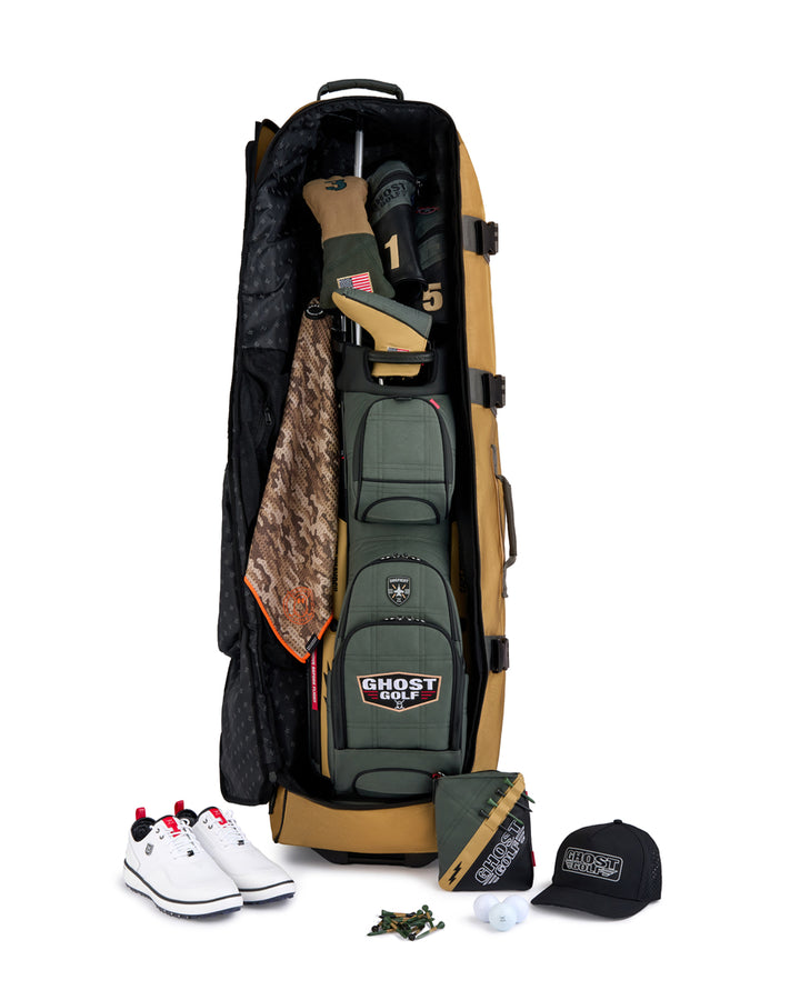 Front product shot of the G-Suit Seoncdary AWOL Travel Bag showcasing a G-Suit golf bag and golf accessories stored inside. Clean front-facing image highlighting the spacious storage capacity, premium travel-ready design, and signature Ghost Golf craftsmanship. #color_sand #color_sand