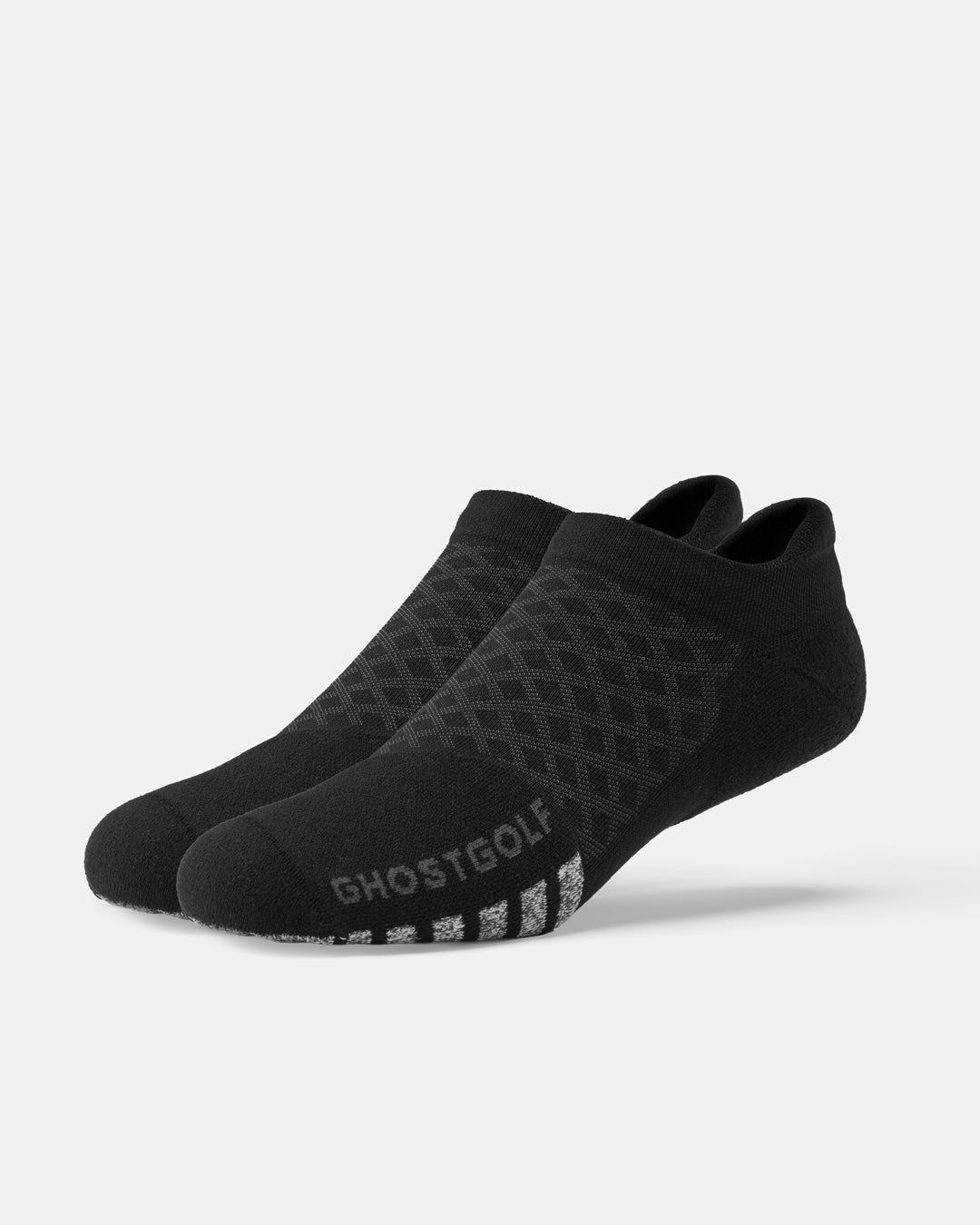 Front product shot of black ankle socks, with one sock featuring ghost golf #color_black