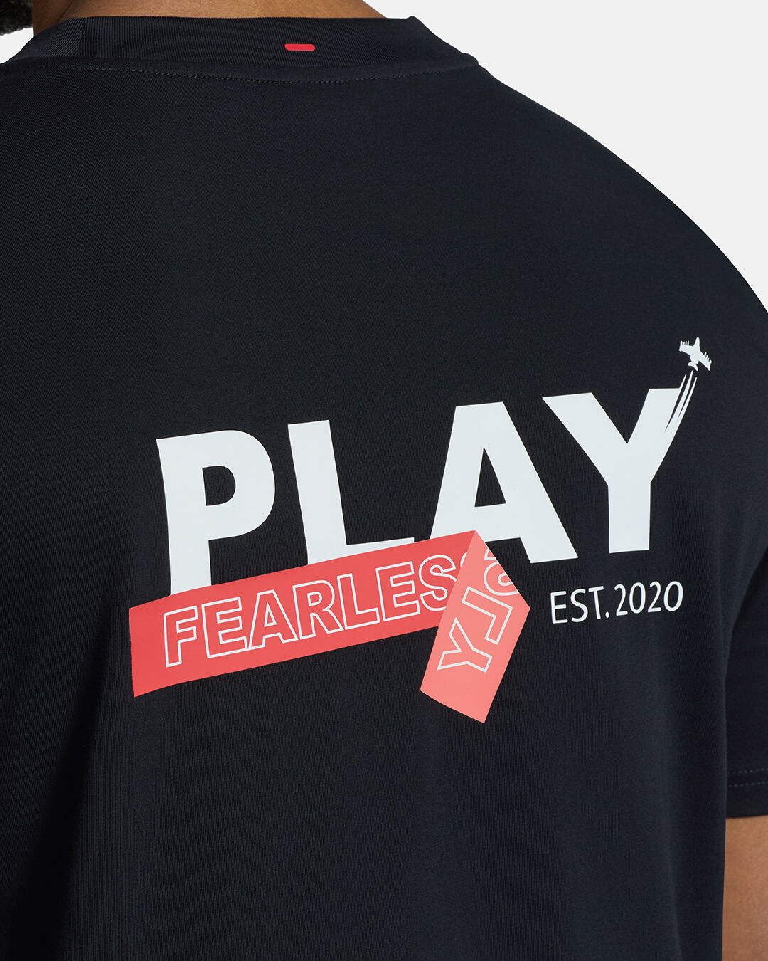 Closeup Shot of Black Flight Tee showcasing back graphic Play Fearlessly Hit #color_black