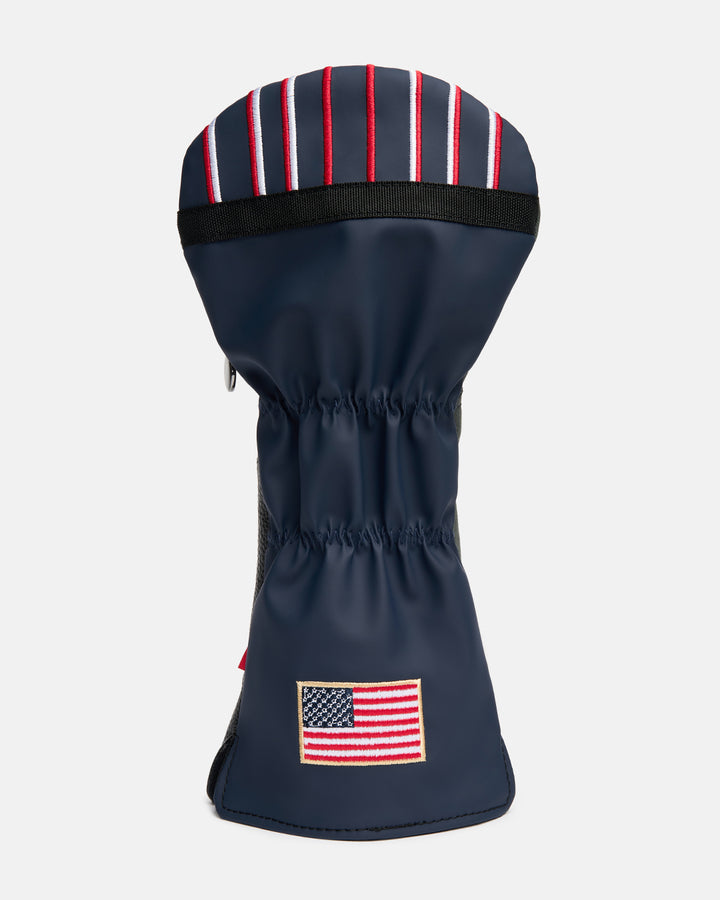 Back product shot of the G-Suit Primary Driver Head Cover featuring an embroidered USA flag on the lower back panel. Rear-facing image highlighting the premium embroidery, aviation-inspired design, patriotic detailing, and signature Ghost Golf craftsmanship. #size_5-wood