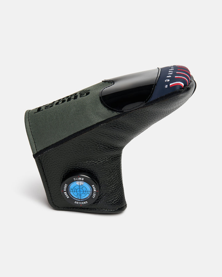 Side product shot of the G-Suit Primary Blade Putter Cover, featuring aviation-inspired compass graphics on the side and Capt Havoc typography embroidered across the top. Angled view highlighting the unique aircraft silhouette, premium embroidery, and signature Ghost Golf military-inspired design details.