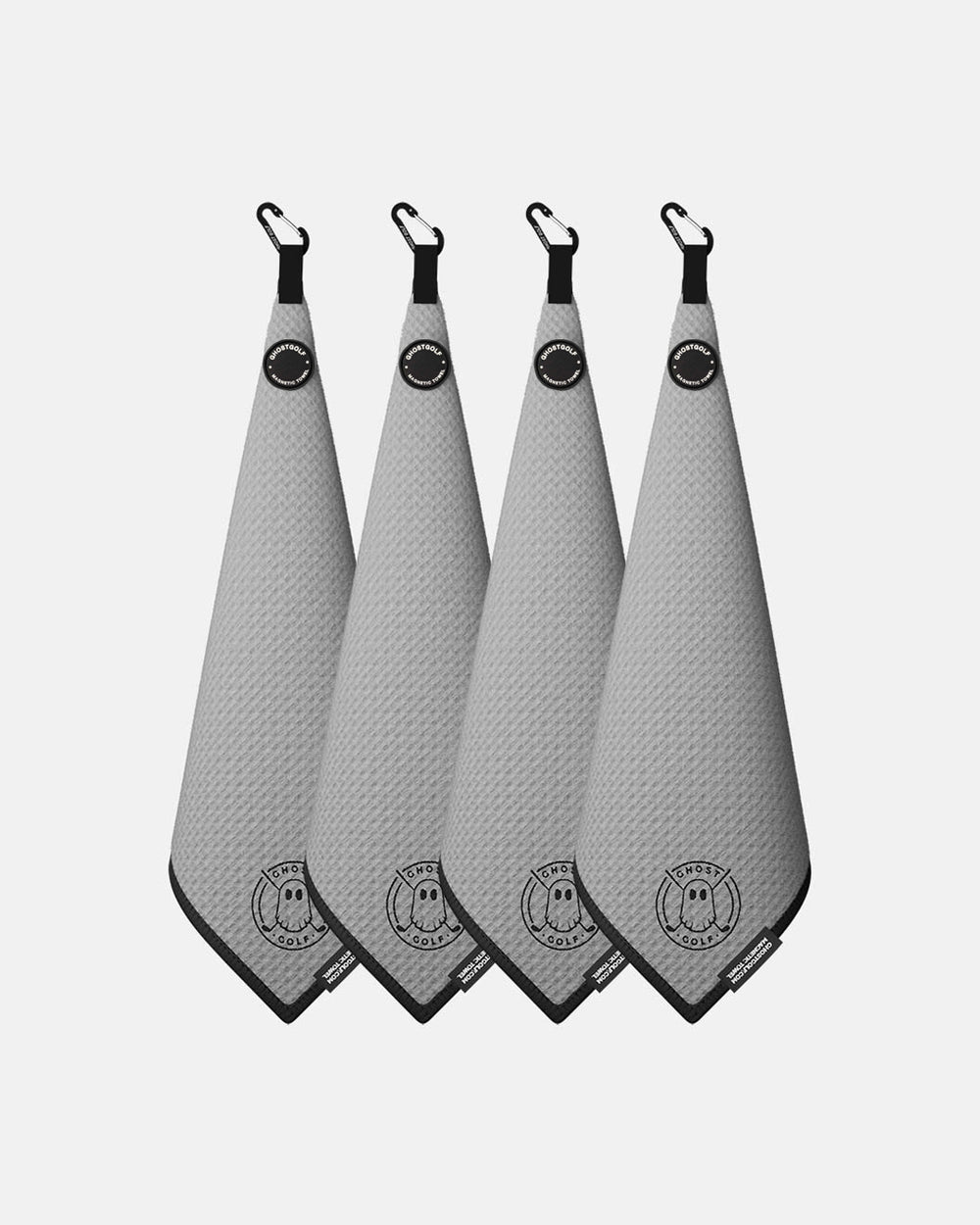Product shot of 4 Pack Grey Ghost Golf Magnetic Greenside Towel with emblem logo near the bottom and carabiner clip at the top #color_grey