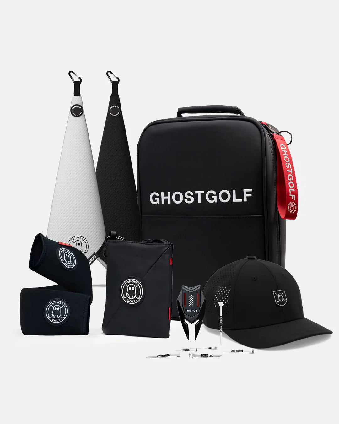 Product Shot of Katana Bundle showcasing 2 greenside magnetic towels, utility pouch, cart strap sleeve, golf hat, divot tool, and golf tees