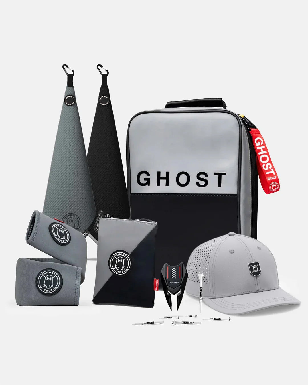 Product Shot of Kovert Ops Bundle showcasing 2 greenside magnetic towels, utility pouch, cart strap sleeve, golf hat, divot tool, and golf tees