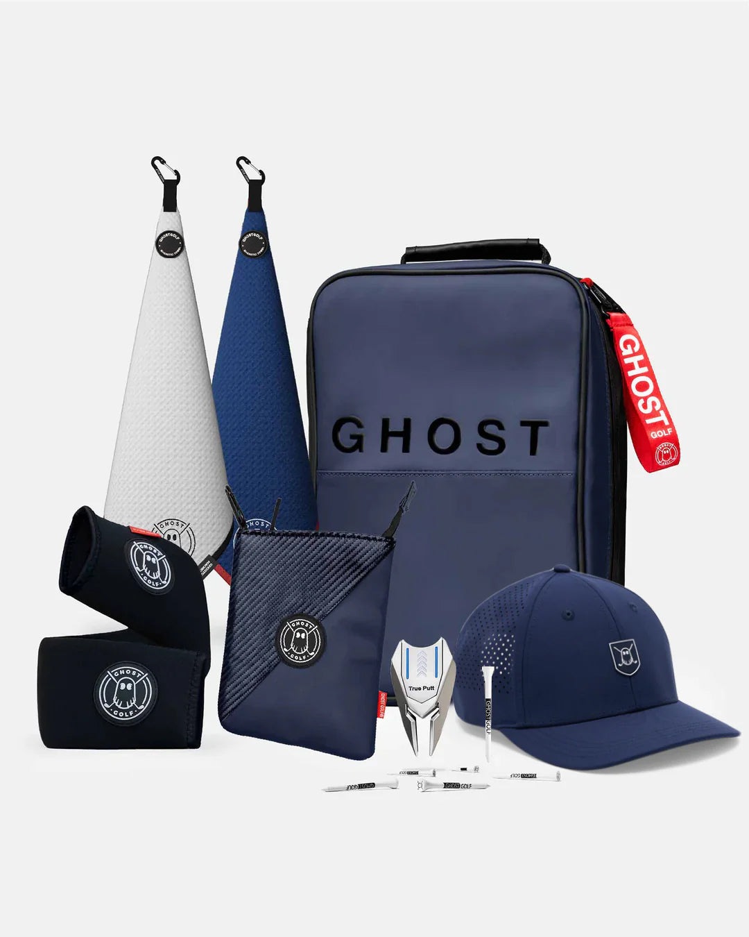 Product Shot of Patriot Bundle showcasing 2 greenside magnetic towels, utility pouch, cart strap sleeve, golf hat, divot tool, and golf tees