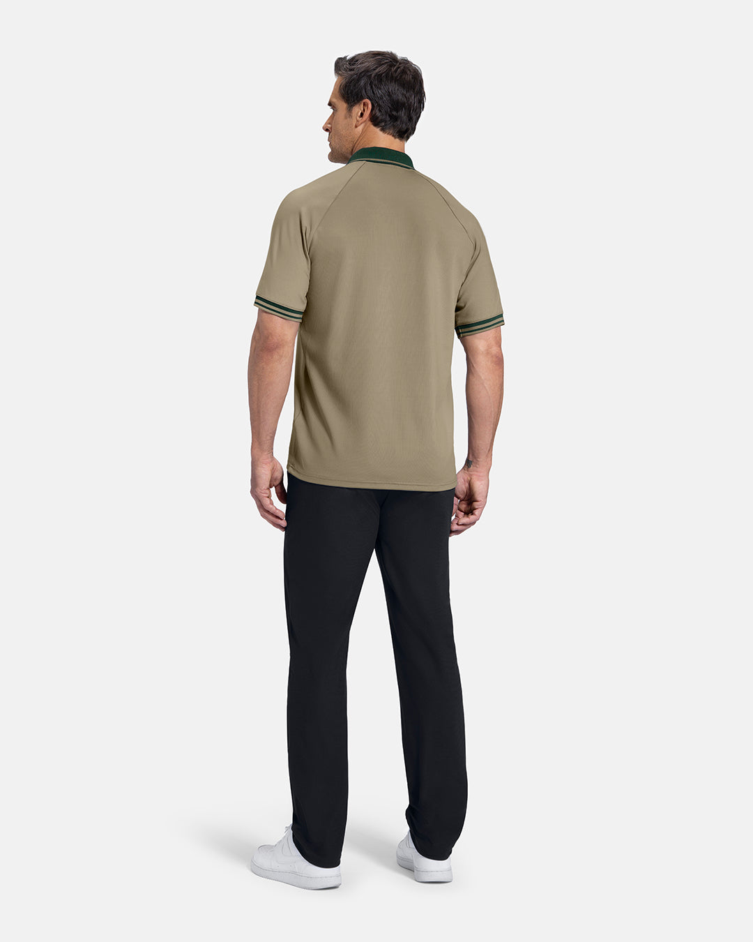 Full Body Back View of SandPatrons Heritage Polo on white male model wearing black pants and white shoes #color_sand-wedge