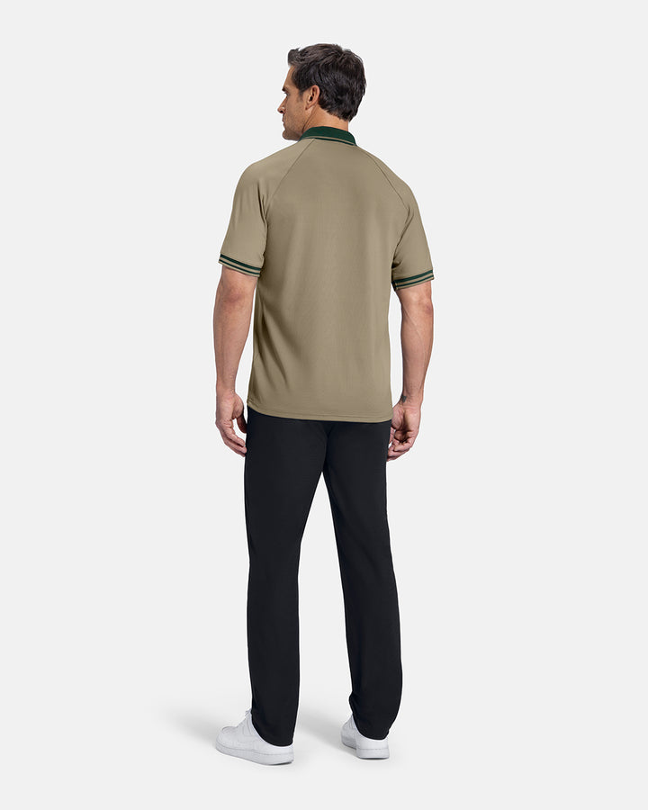 Full Body Back View of SandPatrons Heritage Polo on white male model wearing black pants and white shoes #color_sand-wedge