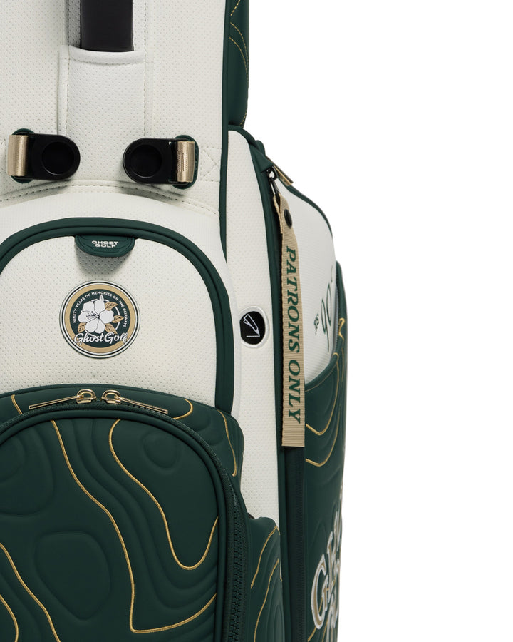 Closeup View of Patrons Only Anday Bag with white and green accents and detail topographic pattern with ghost golf branding #color_green