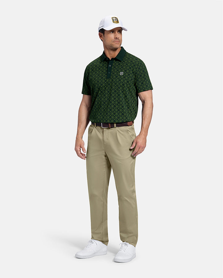 Full Body Front View of Bogey Green Patrons Printed Polo on white male model wearing beige pants brown belt  and white shoes and hat with polo tucked in pants #color_bogey-green
