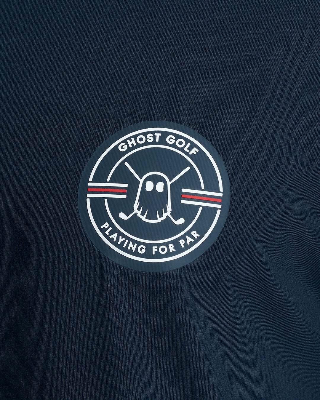 Closeup Shot of Dark Navy Qualifier Fore Par Tee showcasing emblem artwork on chest #color_dark-navy