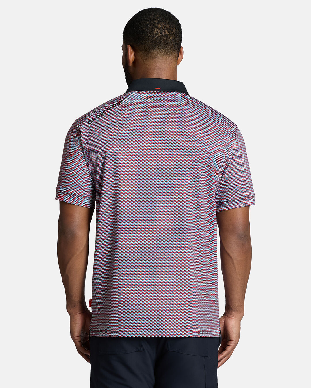 Top Back Body Shot of Black Male Model Wearing Red Qualifier Diamond Polo with navy pants. Ghost Golf Hit on back left shoulder #color_red