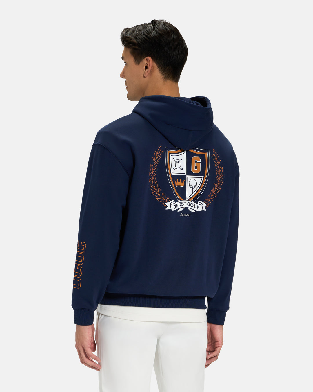Back View of Dark Navy Spectator  Hoodie on Asian Male Model with crest illustration on back #color_navy