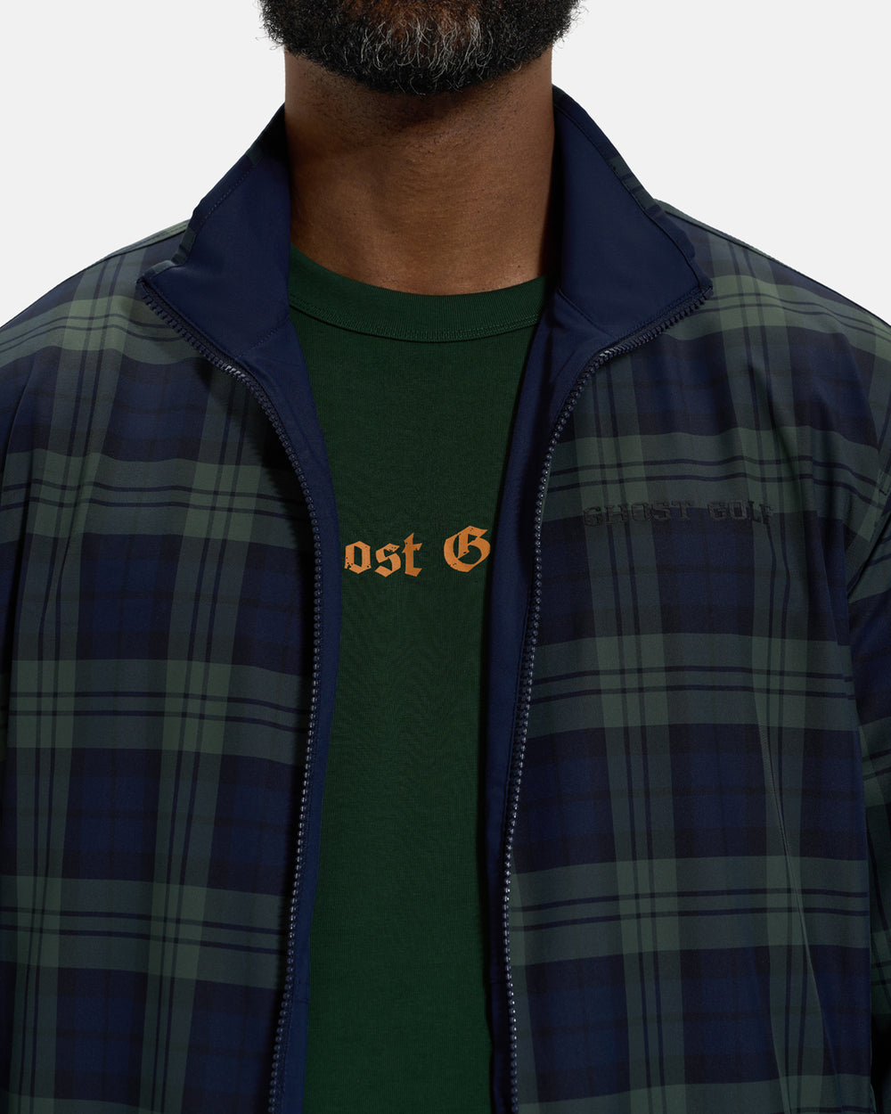 Closeup Front View of Plaid Navy Spectator Reversible Jacket on Black Male Model #color_plaid-navy