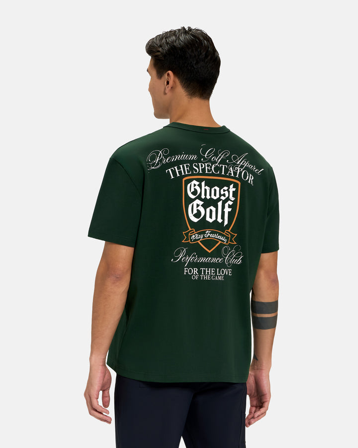 Back View of Bogey Green Spectator Tee on Asian Male Model with Ghost Golf Graphic #color_bogey-green