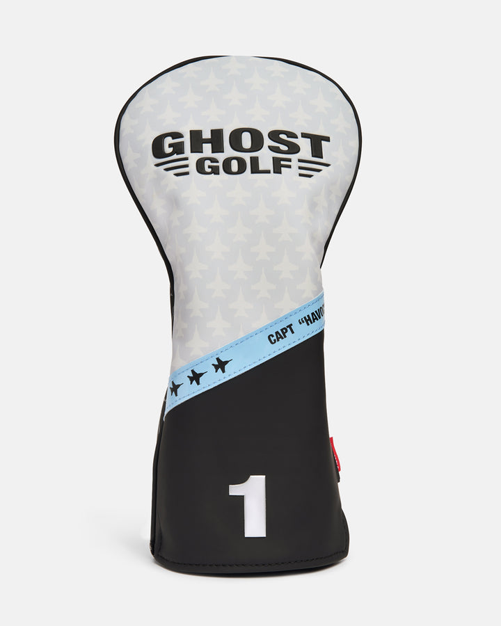 Front product shot of the Striker Secondary Driver Head Cover featuring the Ghost Golf logo, an aviation-inspired fighter jet graphic across the upper portion, and a solid-color lower section with the embroidered number "1." Clean front-facing view highlighting the premium materials, bold design elements, and signature Ghost Golf branding. #size_driver