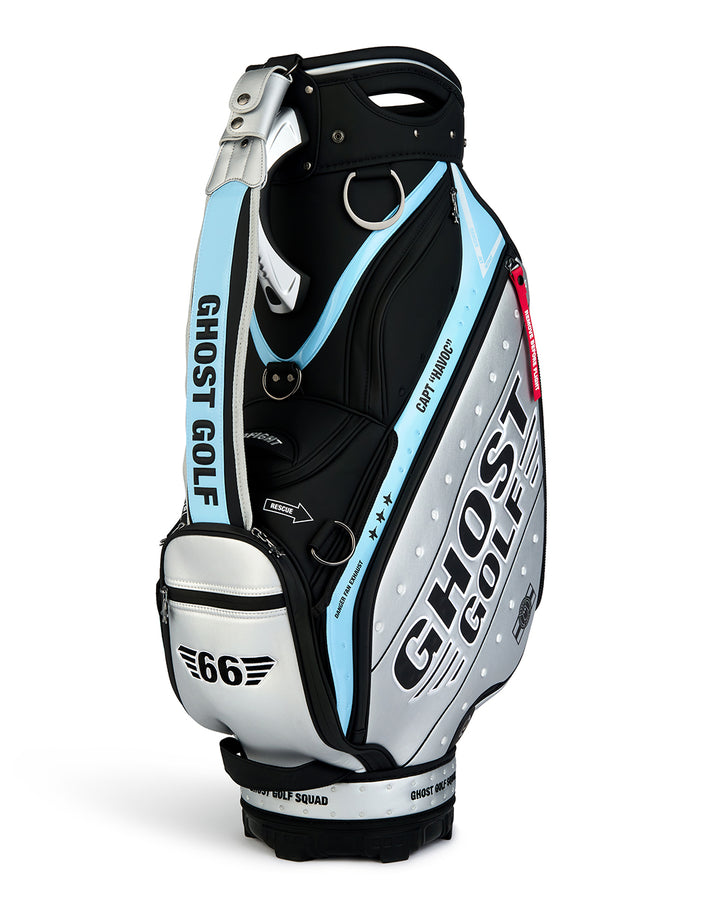 Three-quarter view of the Striker Staff Bag showcasing the padded shoulder strap, premium construction, and streamlined silhouette. Angled product image highlighting the bag's carrying comfort, functional design, and signature Ghost Golf details.