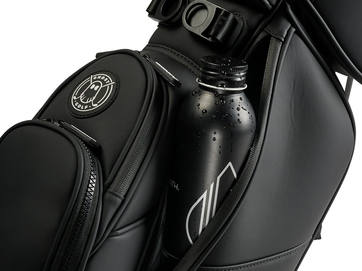 Black golf bag with a water bottle and logo on a white background