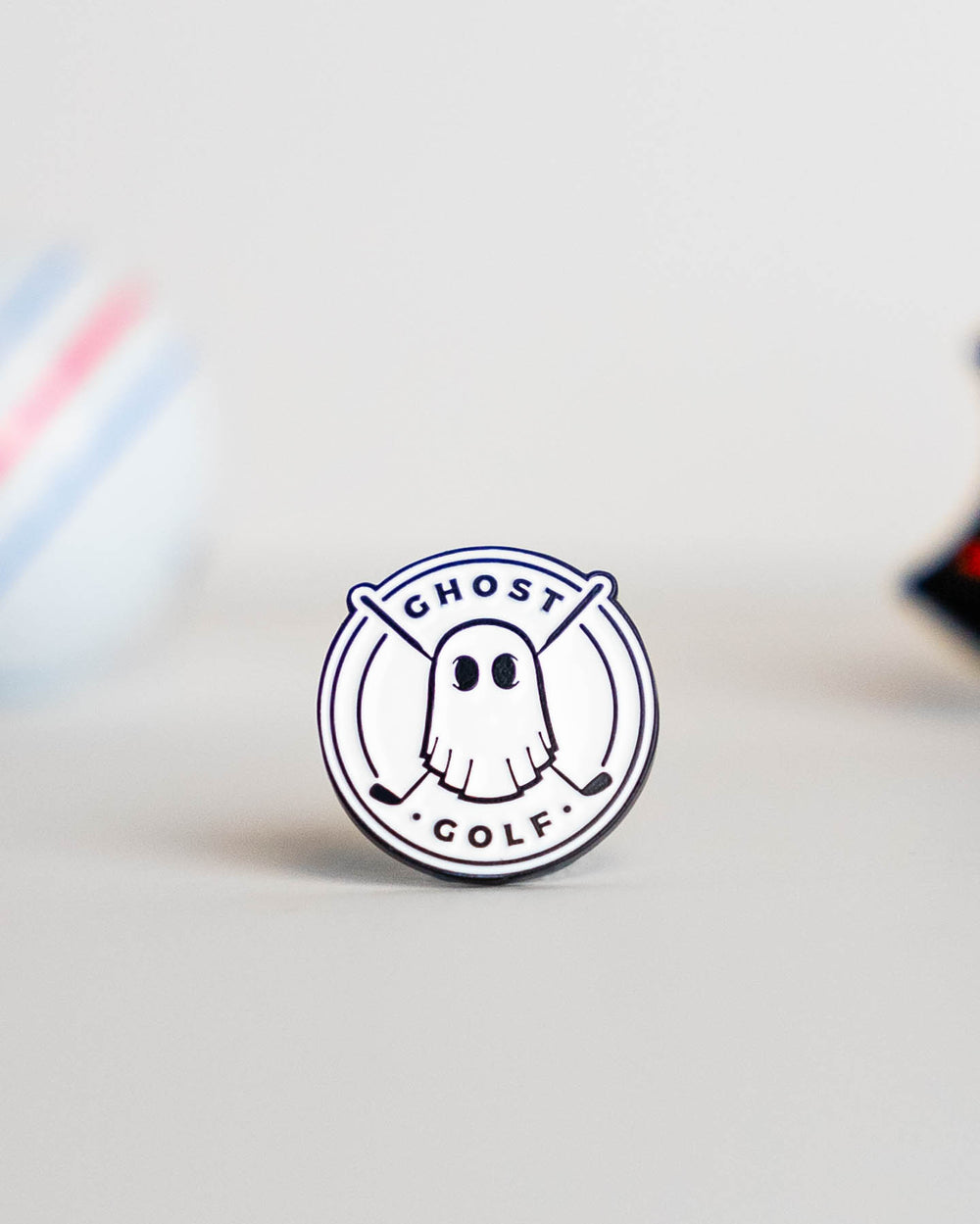 Golf Ball Marker White Circle with Black Ghost Logo