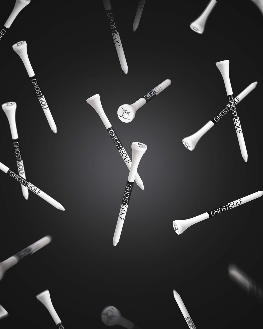 Image of Golf Tees falling with a black background